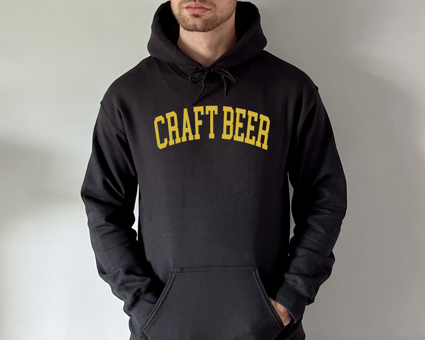 Craft Beer Hoodie in Black on a male model.