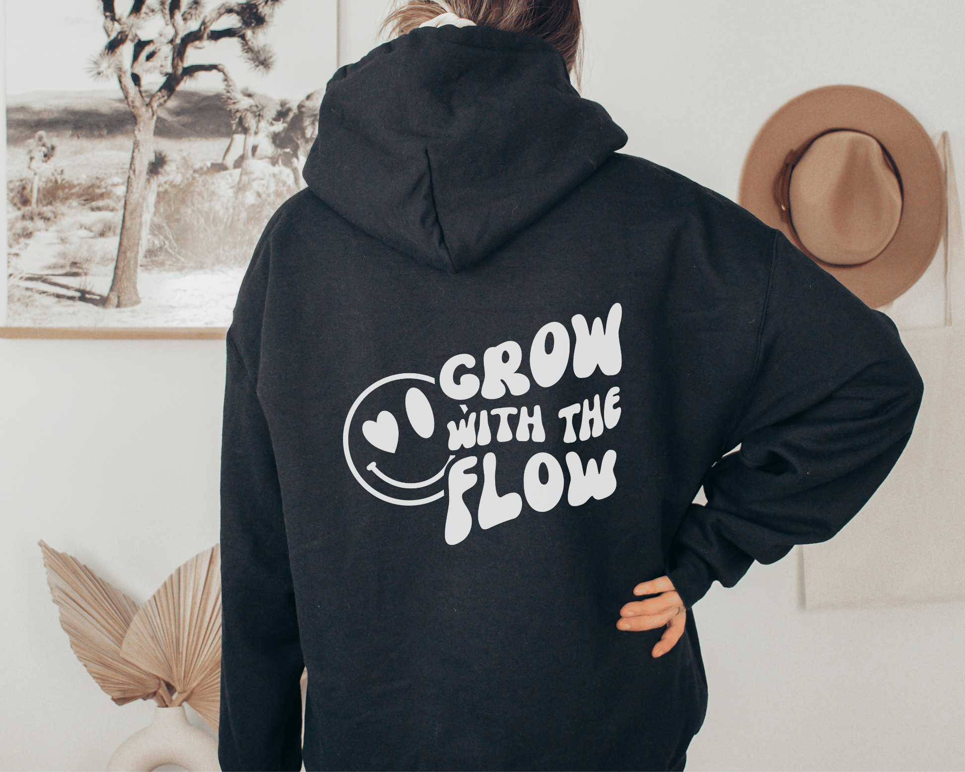 Grow with the Flow Hoodie in Black, back of hoodie.