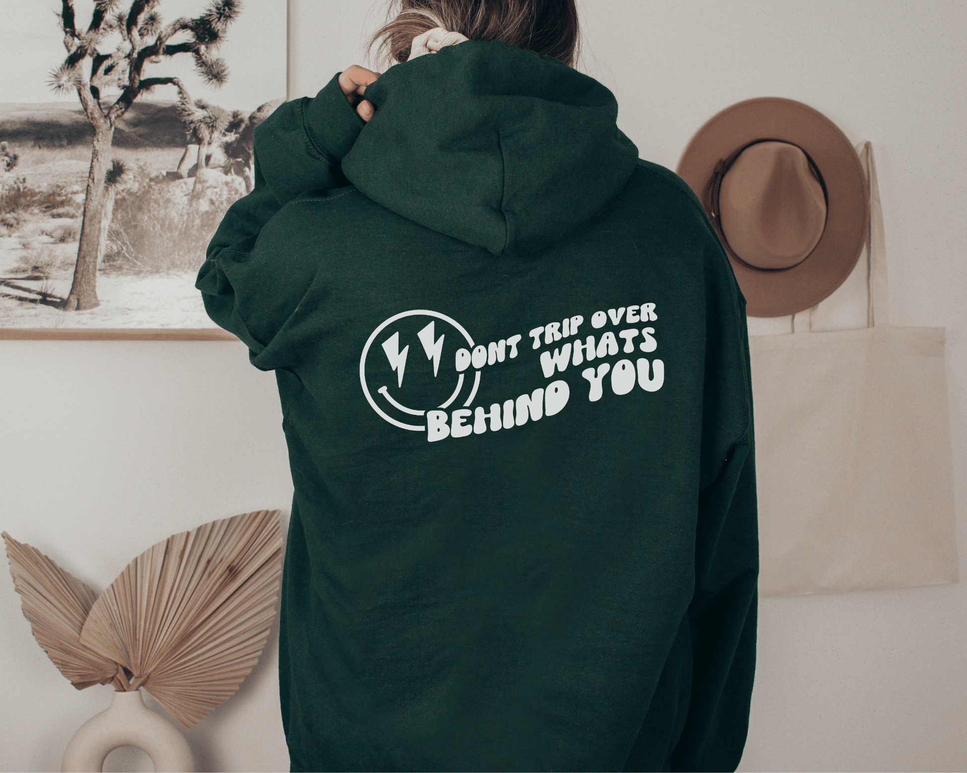 Don't Trip Over What's Behind You Hoodie in Forest, back of hoodie. 