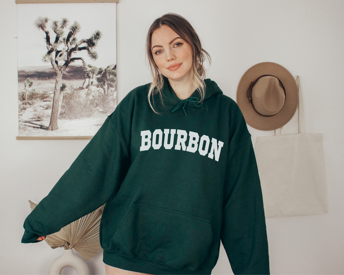 Bourbon Hoodie in Forest on a Female