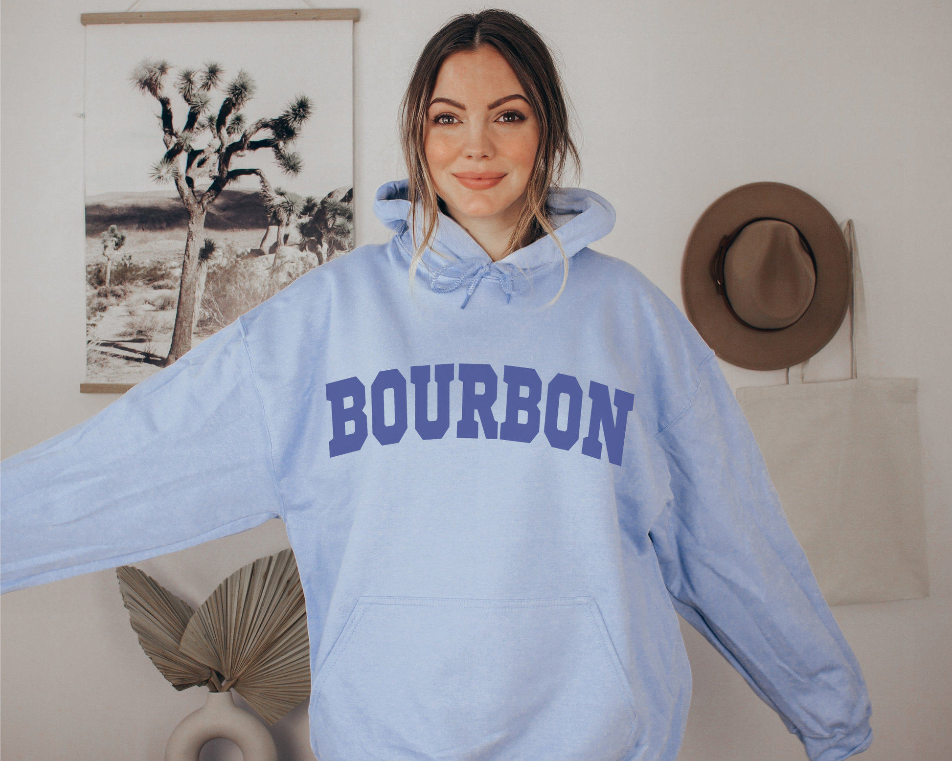 Bourbon Hoodie in Light Blue on a Female