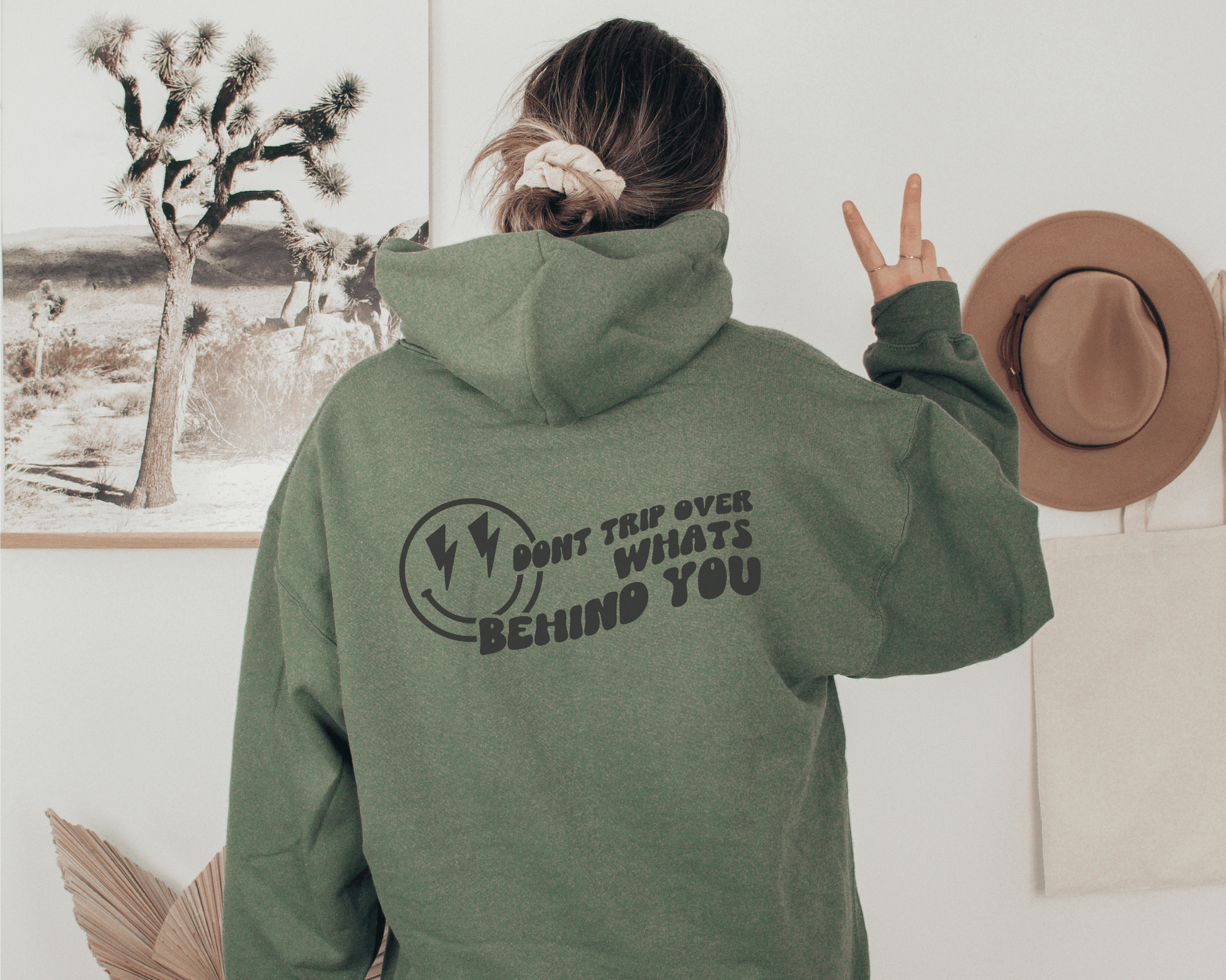 Don't Trip Over What's Behind You Hoodie in Military Green, back of hoodie.