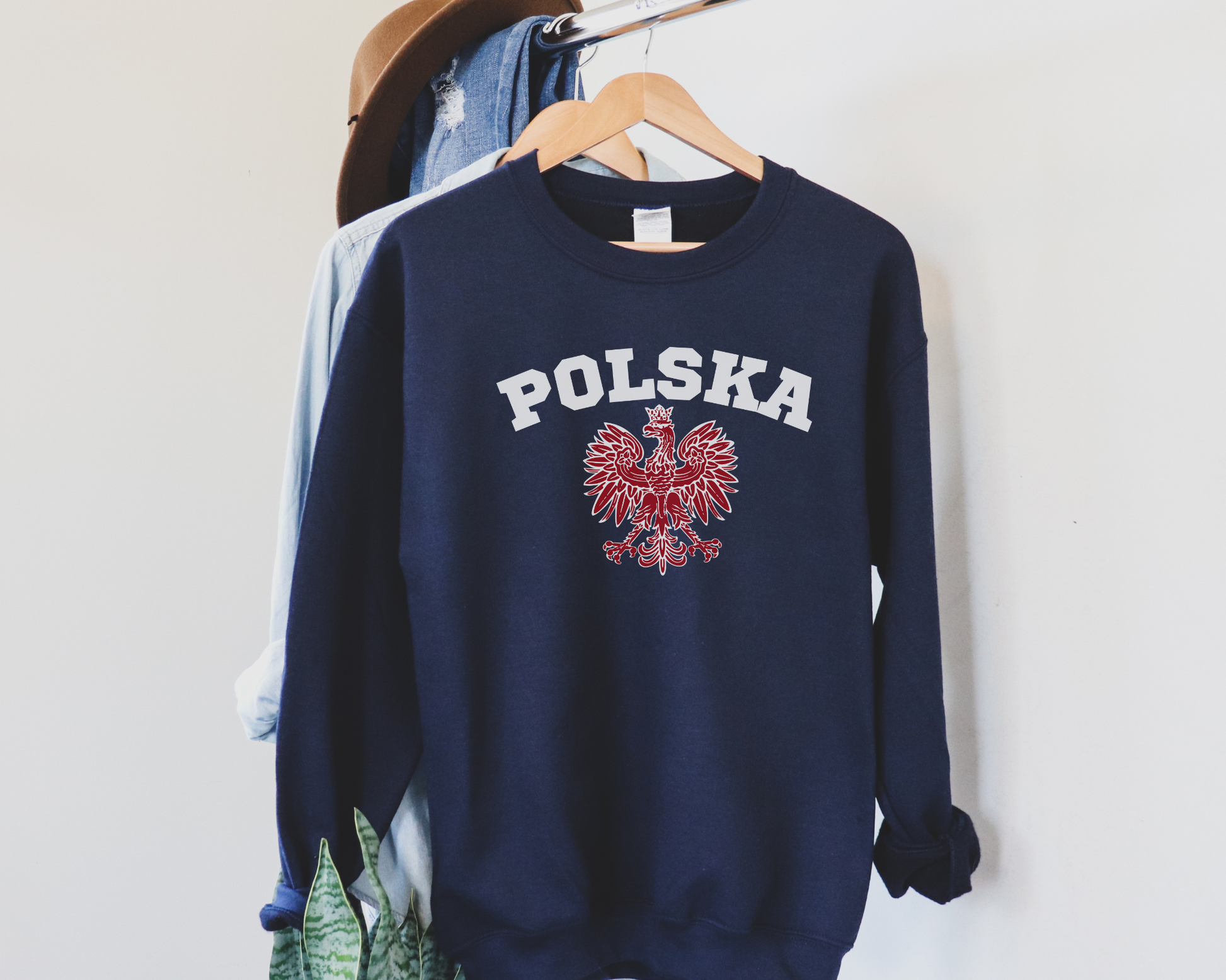 Polska Polish Sweatshirt in Navy, hanging.