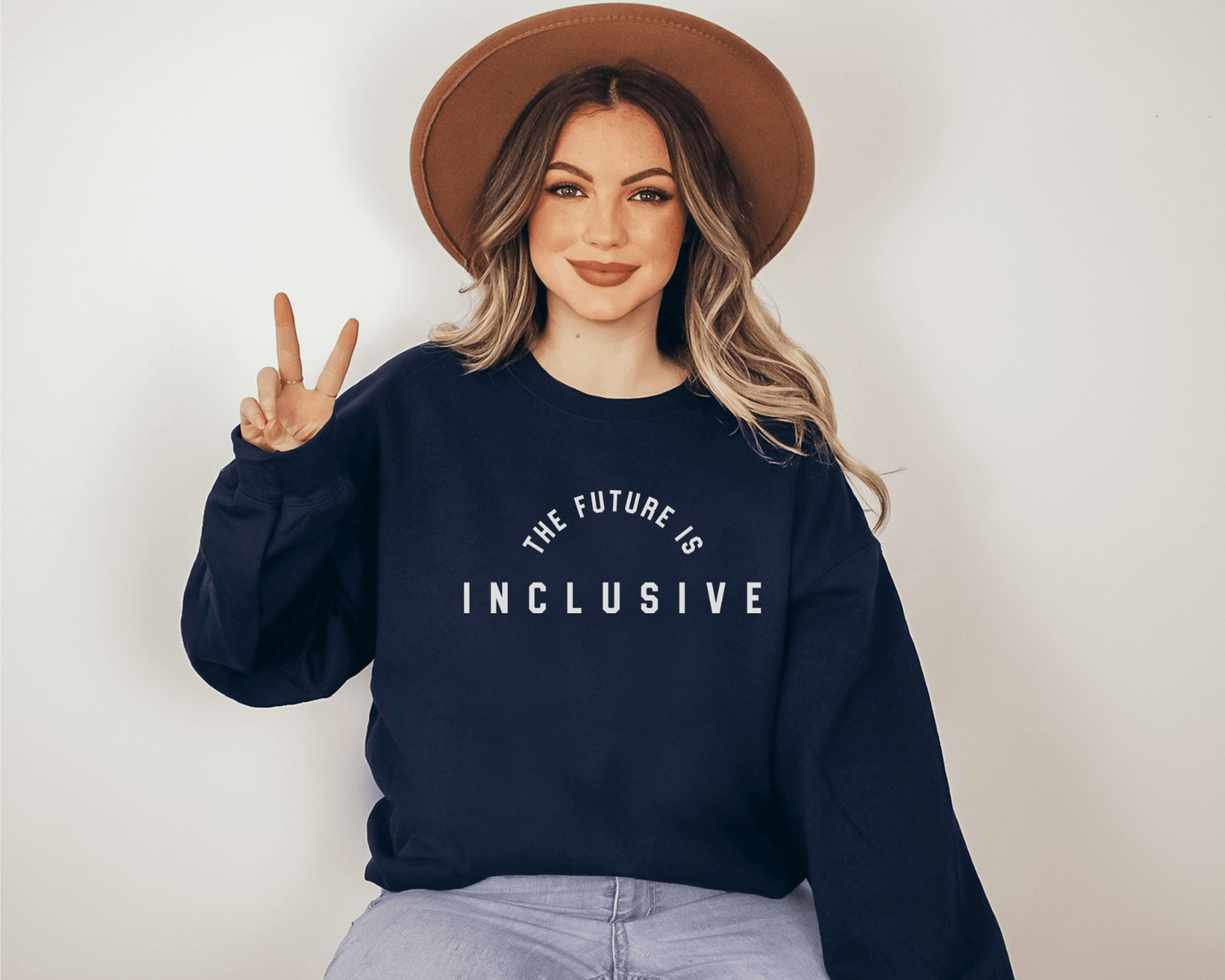 The Future is Inclusive Sweatshirt in Navy on a female model.