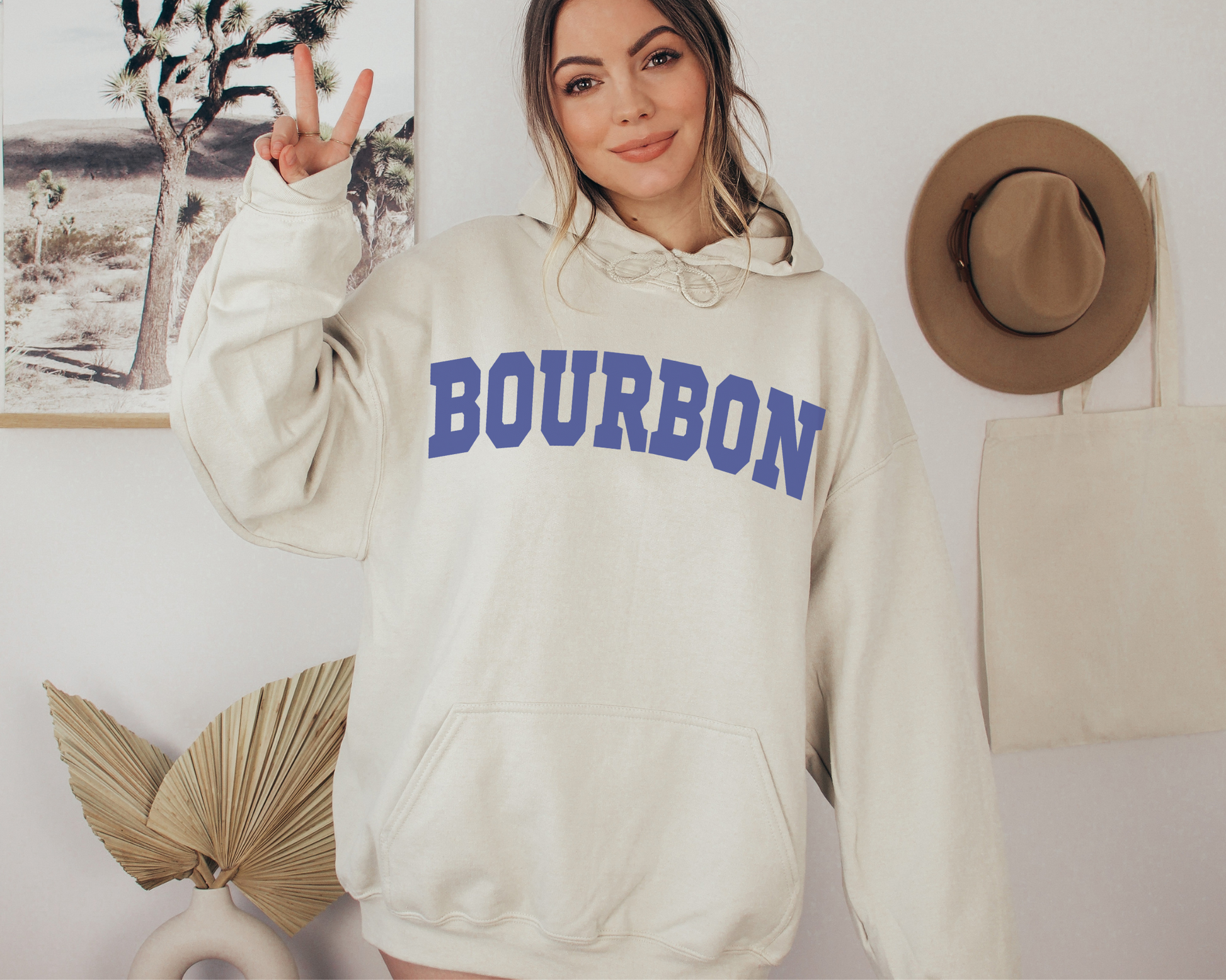 Bourbon Hoodie in Sand on a Female